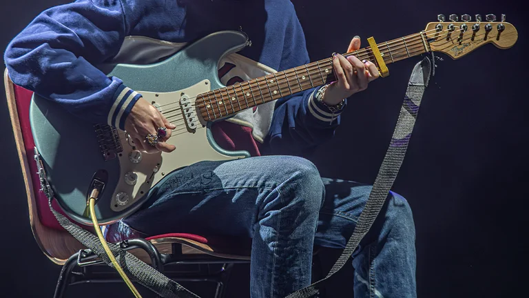 person playing guitar