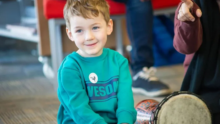 Child in a drum workshop