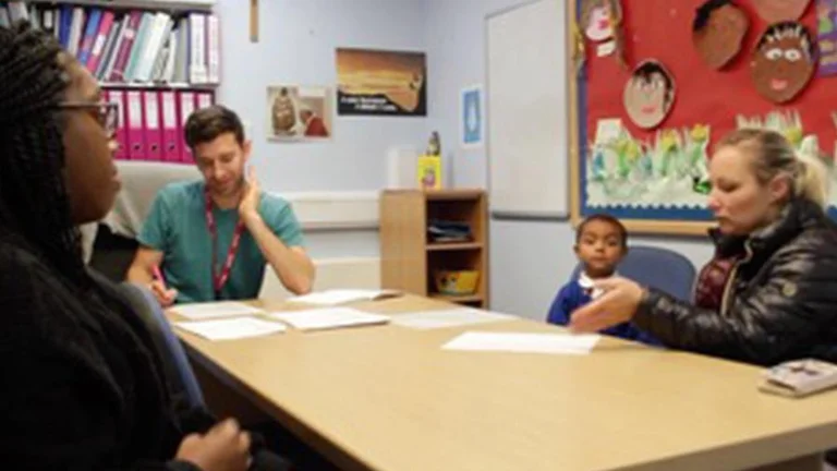 A meeting in a school