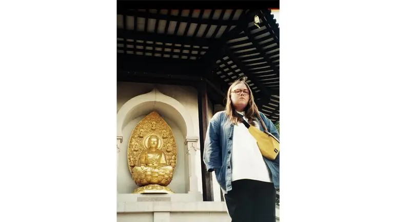 Emma standing in front of a temple