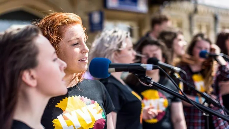 A group of female singers perfoming