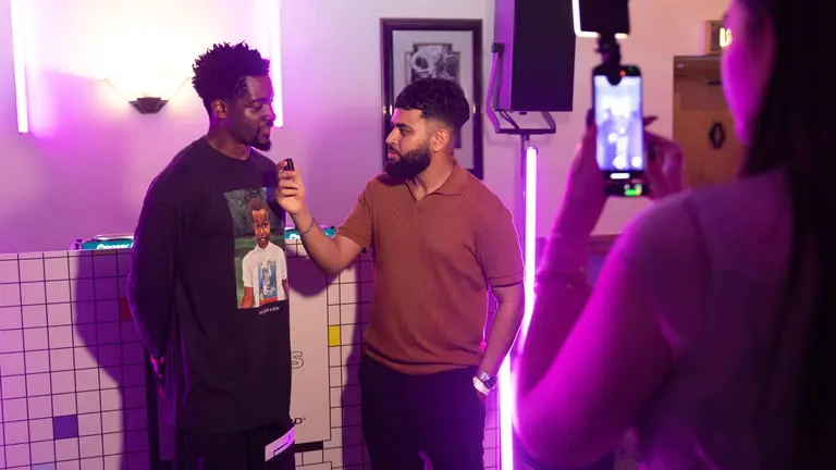 man interviewing another man