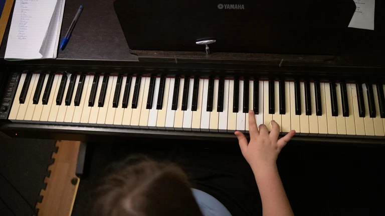 child playing piano