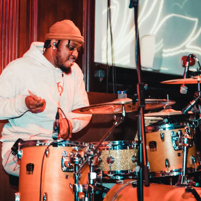 a drummer plays the drums